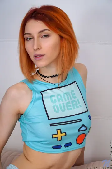 Petite Redhead Undresses and Gapes Her Pussy Wide