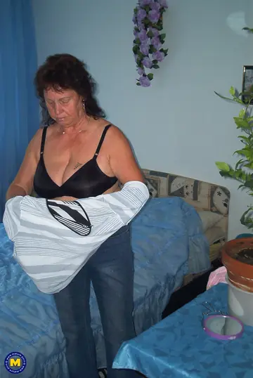 Curvy Mature European Woman Strips and Shows Her Big Tits