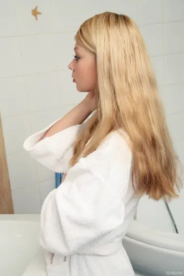 Woman Turns and Glances Over Her Shoulder in a Glamour Set