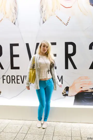 Blonde with Short Hair Shows Her Waistband in Heels