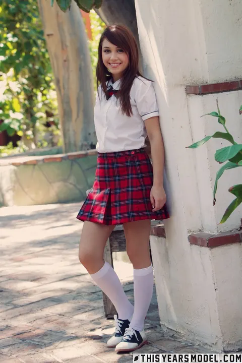 Marissa Mei: Thick Redhead in a Skirt and Uniform Top Poses in the Garden – photo 2 of 15