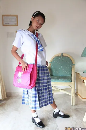 Petite Filipina in Uniform Lifts Hem and Spreads Her Pussy