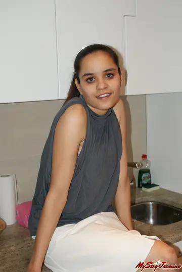 Jasmine Mathur – Asian Brunette in a Skirt and Top Shows Her Bare Feet