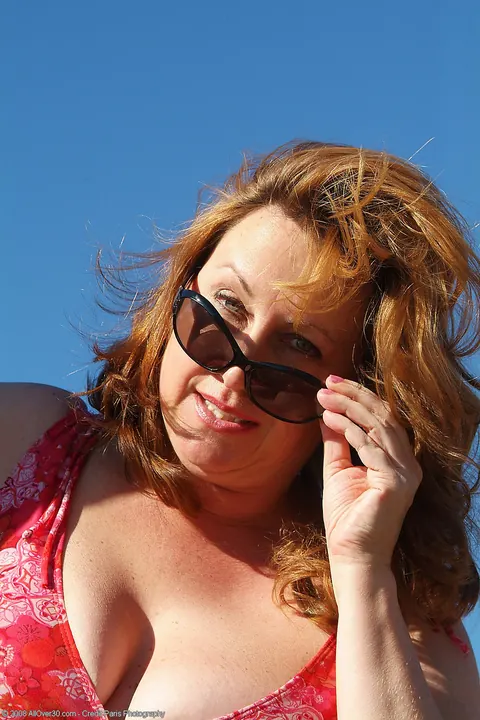 Marishka: Curvy Mature Redhead Flaunts Her Big Tits on a Tractor – photo 4 of 20