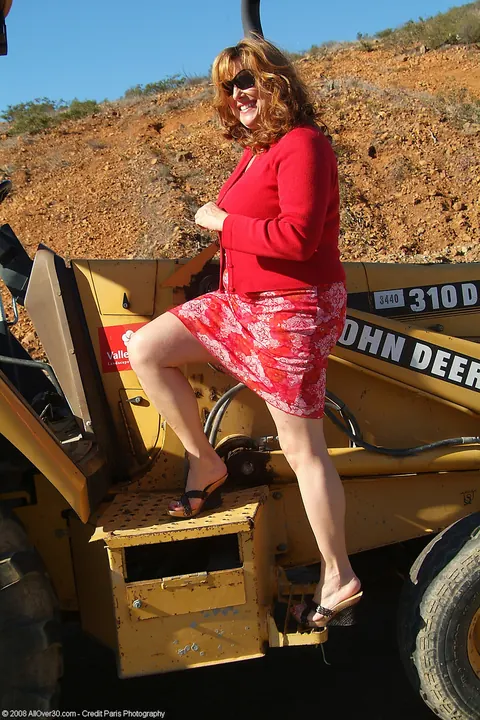 Marishka: Curvy Mature Redhead Flaunts Her Big Tits on a Tractor – photo 2 of 20