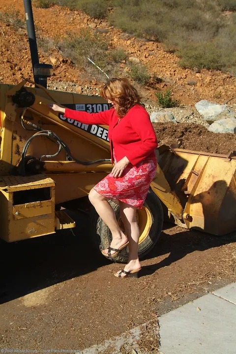 Marishka: Curvy Mature Redhead Flaunts Her Big Tits on a Tractor – photo 1 of 20