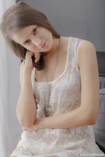 Slim Amateur in Lingerie Pulls Panties Aside to Finger Herself