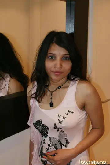 Kavya Sharma – Busty Indian MILF Shows Off Her Short Dress
