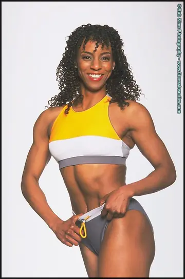 Thick Ebony Fitness Model Strips to Lingerie and Panties