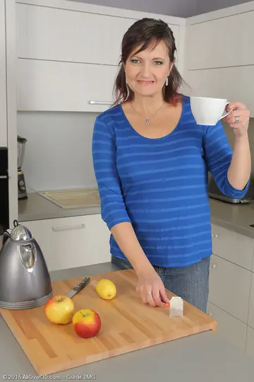 Busty Czech MILF Fingers Her Hairy Pussy in the Kitchen