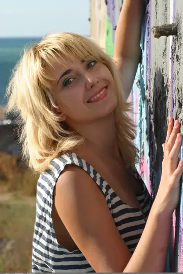 Siera – European Blonde with Short Hair Strips Nude and Spreads Her Pussy