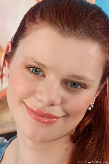 Benji – Redhead Frees Her Natural Tits and Fingers Her Hairy Pussy