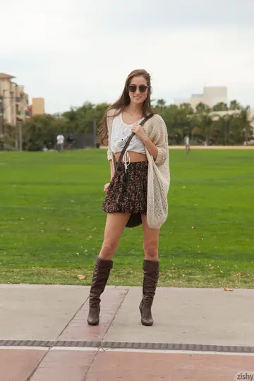 Petite Brunette in Stockings and Boots Spreads Outdoors