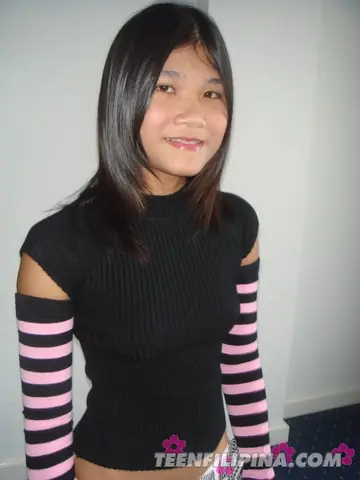 Asian Brunette in a Skirt and Striped Socks Spreads Her Hairy Pussy