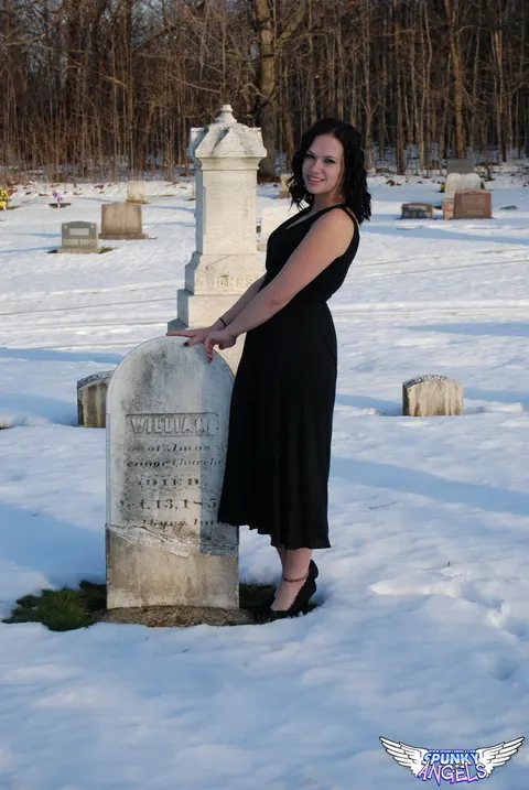 Emily Love: Brunette Flashes Her Natural Tits in a Winter Graveyard – photo 1 of 12