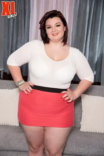 Curvy Brunette MILF Poses in a Skirt and Panties Showing Her Big Tits