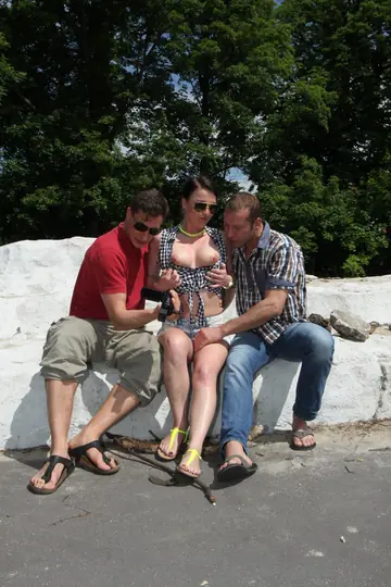 Busty Brunette Takes Two Men Doggy Style on a Boat