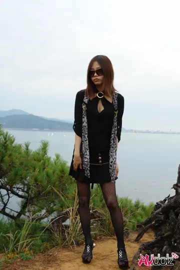 Japanese Redhead Strips Out of Her Pantyhose by the Ocean