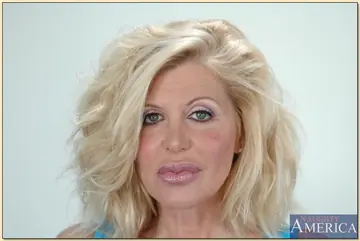 Sharon Kane – Mature Blonde with Big Tits Strips Off Her Lingerie and Spreads Her Hairy Slit