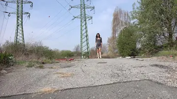 Eveline Neill – Tall Slim Brunette Pisses in Her Boots on a Paved Road