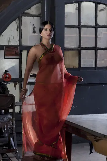 Sunny Leone – Busty Indian MILF Strips Out of Her See-Through Attire