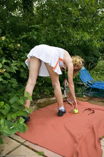 Slim Blonde MILF Strips Off Her Tennis Uniform and Spreads Hairy Holes
