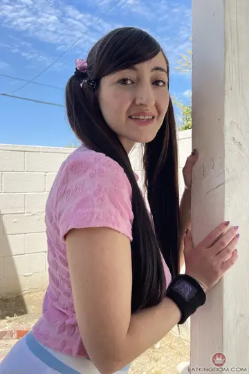Tifa Quinn – Slim Brunette in Pigtails Poses and Spreads Her Legs