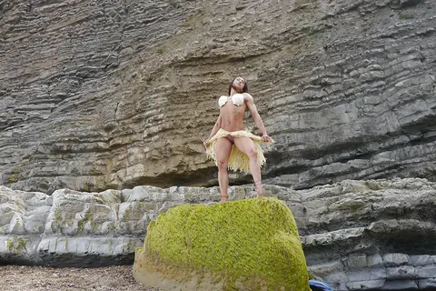 Karyn Bayres: Thick Brunette MILF Flexes Muscular Body on the Beach – photo 6 of 16