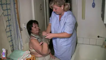 Curvy MILF Nurse with Short Hair Fingers Herself and Spreads Wide