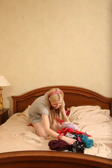 Blonde Strips Out of Her Lingerie and Poses in a Skirt and Socks
