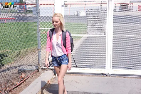 Sammie Daniels: Petite Blonde in Jeans Poses Outdoors After Classes – photo 1 of 16
