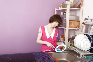 Pale Short-Haired Woman Undresses and Spreads in the Kitchen