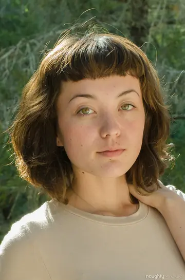 Short-Haired Amateur in Lingerie Bares Her Hairy Pussy Outdoors