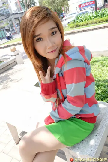 Petite Asian Redhead Lifts Her Skirt and Spreads Her Trimmed Pussy