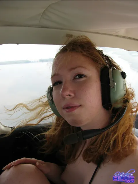 Nicki Blue: Thick Redhead Strips Nude on Small Plane – photo 8 of 15