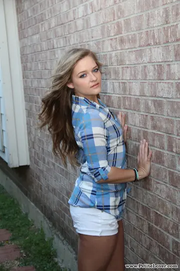 Woman Pulls Down Her Shorts Outdoors