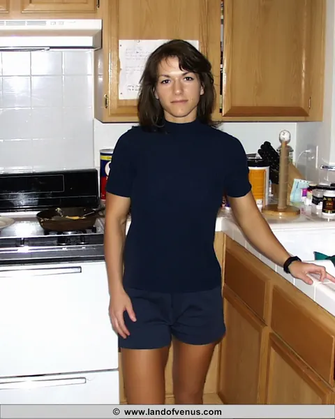 Venus: Thick Brunette MILF Poses in Shorts in the Bathroom – photo 1 of 10