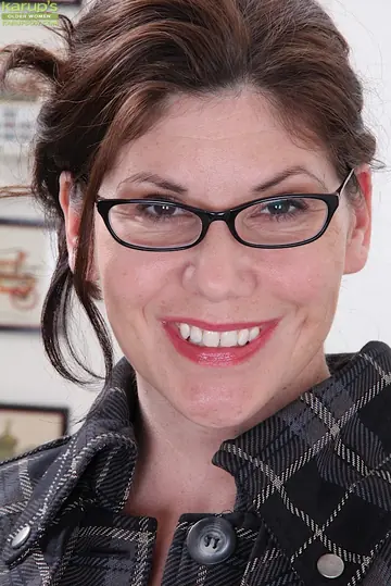 Arden Delaney – Mature Woman in a Skirt and Heels Removes Glasses and Spreads