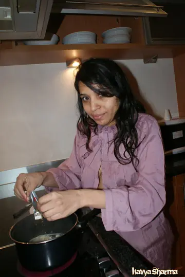 Kavya Sharma – Busty Indian MILF Strips Out of Her Shorts on the Sofa