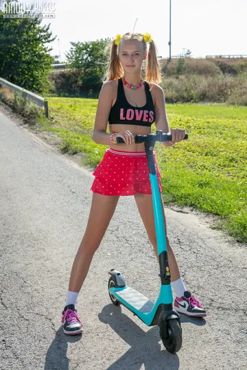 Woman in a Skirt and Panties Gets Fucked on a Scooter in Public