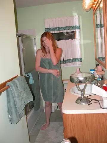 Redhead in the Bathtub Fingers Her Pussy and Spreads Wide