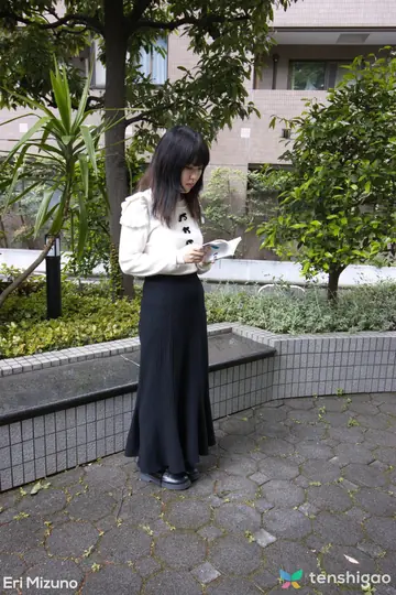 Japanese Babe Strips Naked in the Bedroom