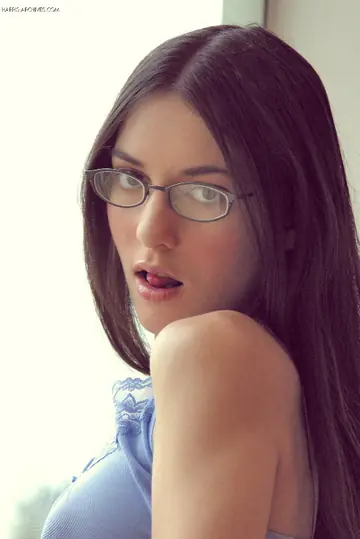 Brunette in Glasses Smokes and Lifts Her Shirt