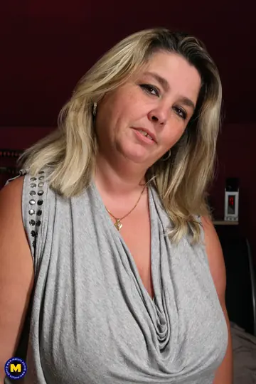 Mature BBW Undresses and Toys Her Pussy with a Dildo