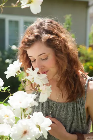 Ursa Finley – Petite Curly Redhead Poses in Shorts and Glasses Outdoors