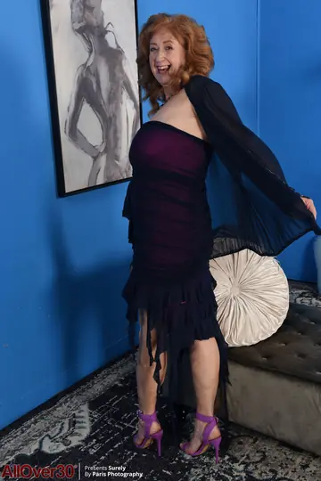Mature Curly Redhead with Big Tits Spreads Outdoors in Heels