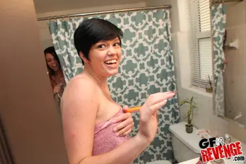 Veronica Wild – Two Brunette PAWGs Share a Dildo in the Bathroom