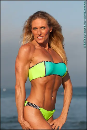 Thick Blonde MILF Flexes in a Bikini on the Beach