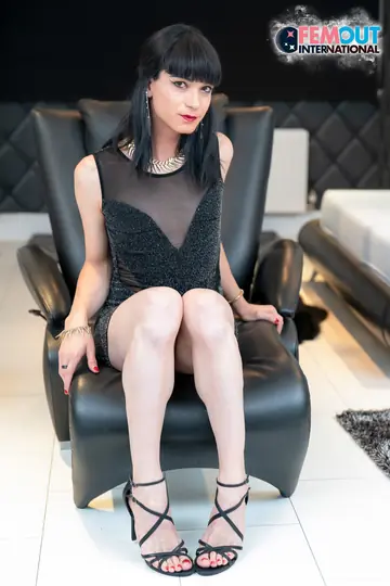 Trans Woman Strips and Poses Nude on Her Side