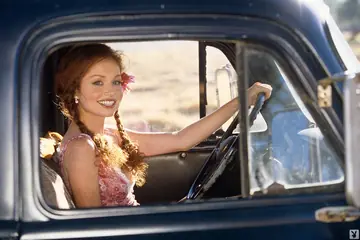 Scarlett Keegan – Skinny Redhead MILF Poses Nude in Farm Truck in the Forest